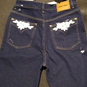 Womans miu miu nwt blue Jean's distressed
